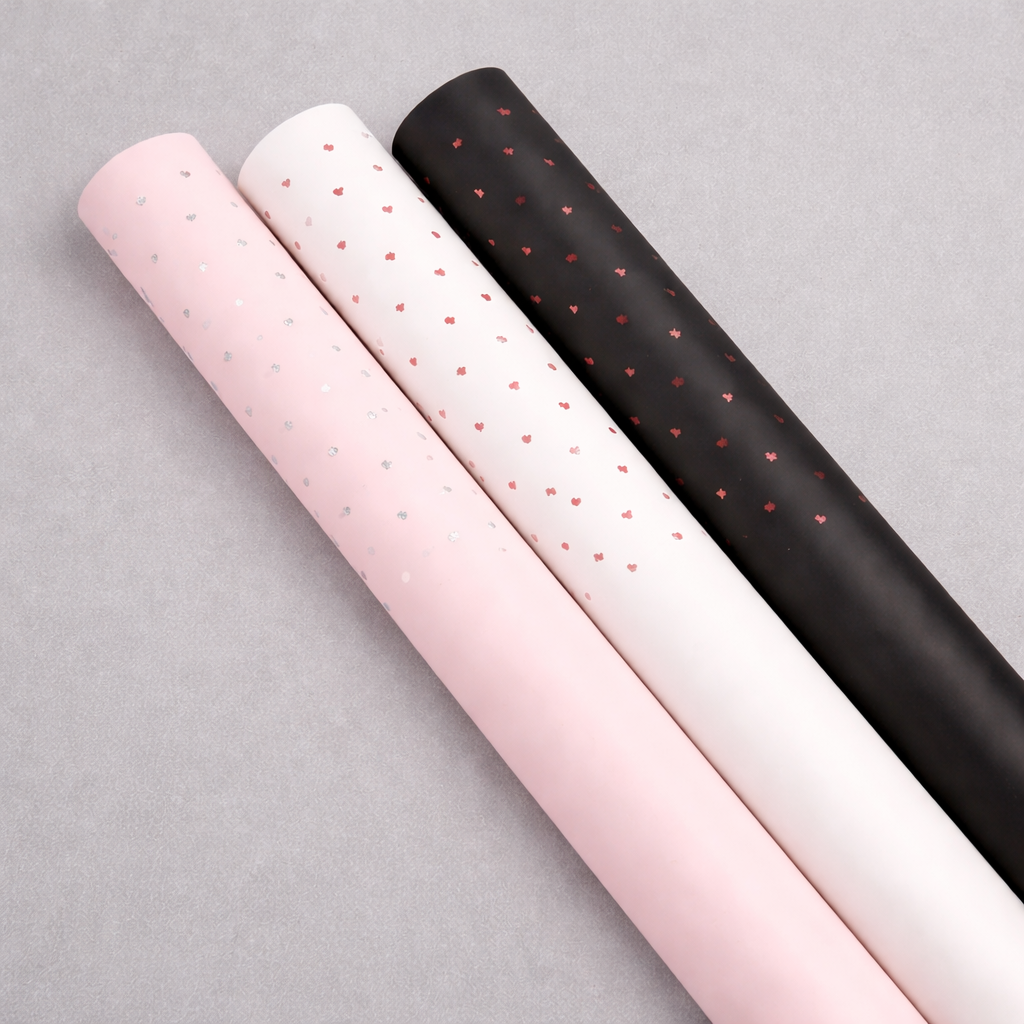 Folia florystyczna w DROBNE SERDUSZKA w arkuszach 58x58 cm, 20 ark/opak