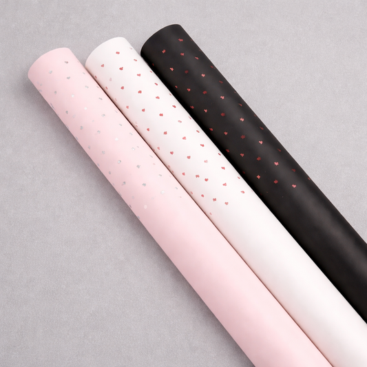 Folia florystyczna w DROBNE SERDUSZKA w arkuszach 58x58 cm, 20 ark/opak